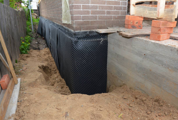 SJ Waterproofing Pros technician performing targeted Foundation Crack Repair assessment in Corryton, TN